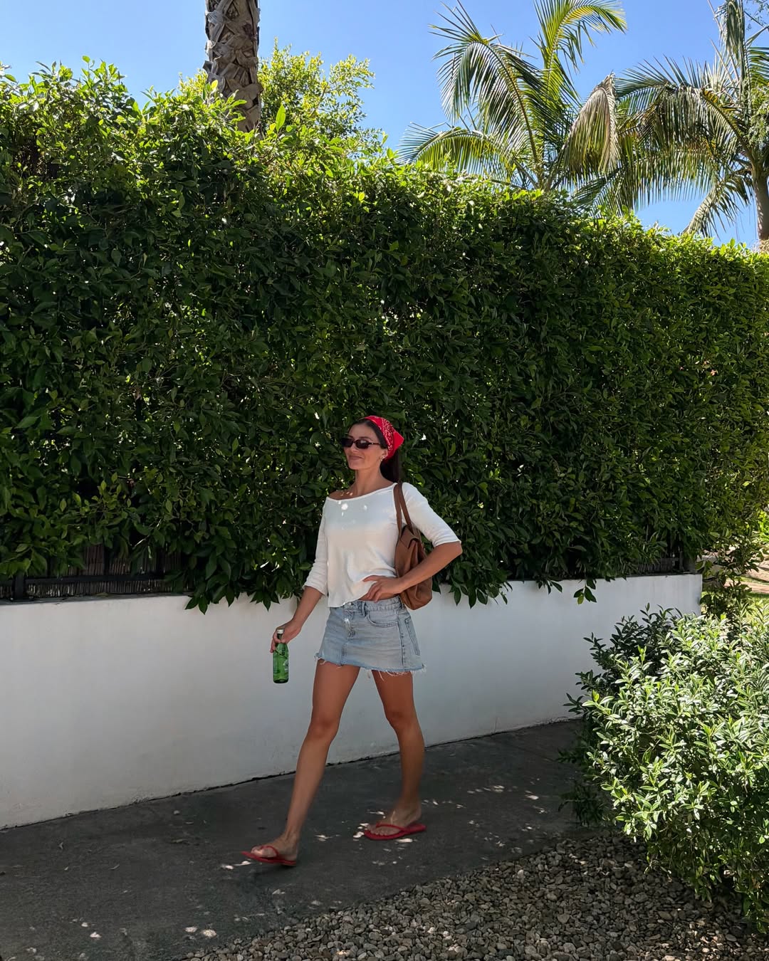 Hasley Pitman in a denim miniskirt.