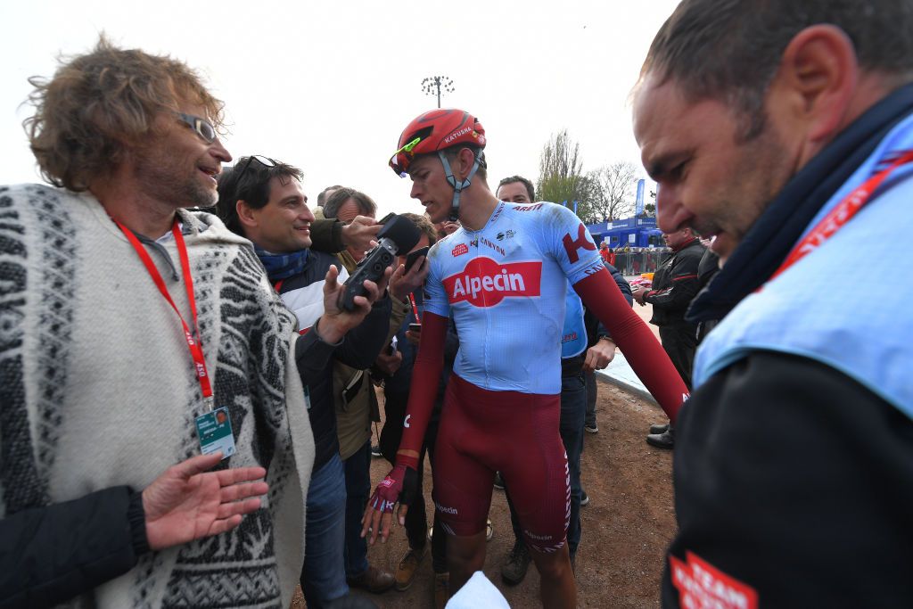 Nils Politt talks to the press after finishing second