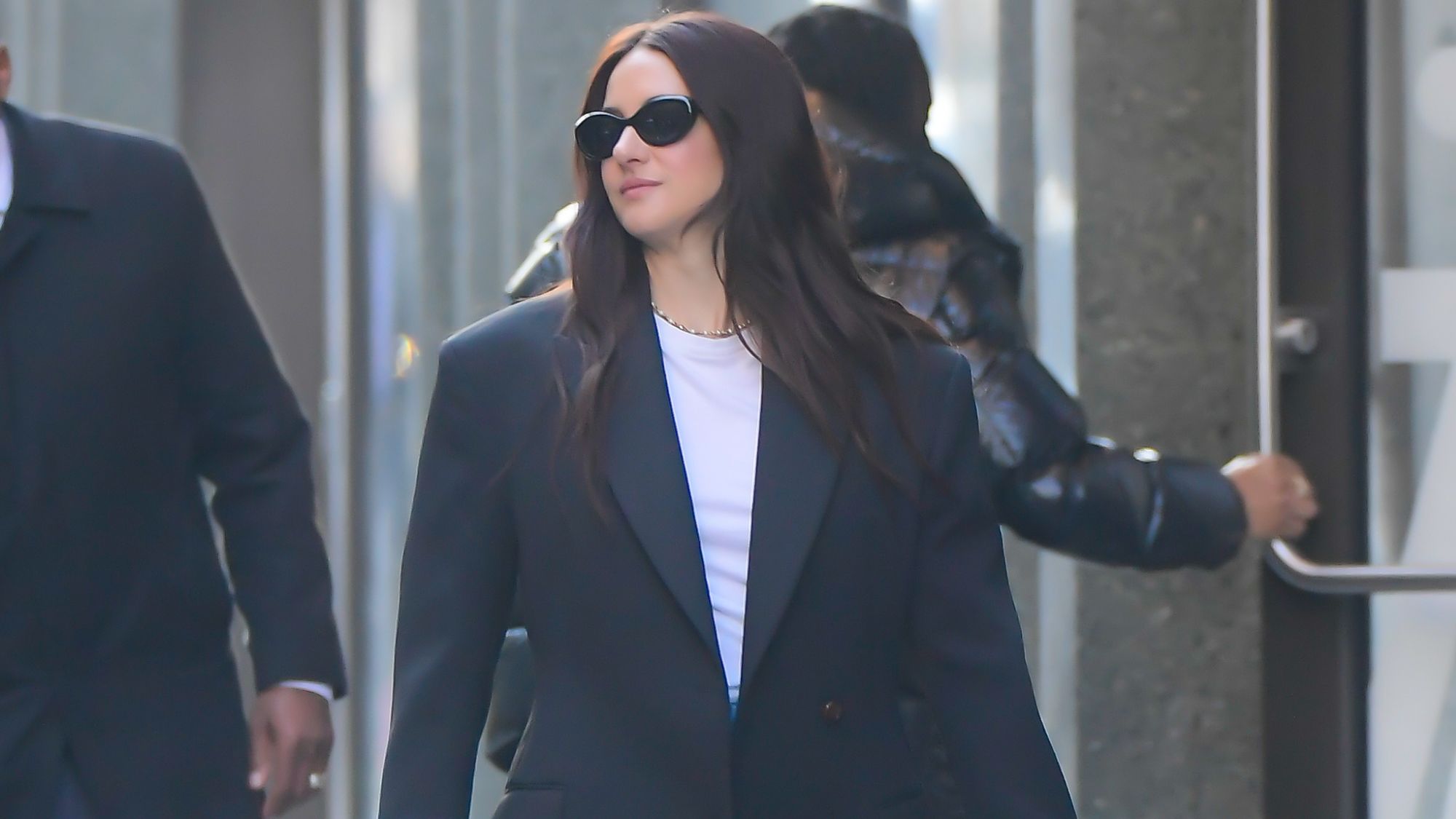 Shailene Woodley wearing jeans and loafers