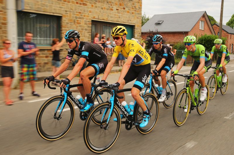 Chris Froome riding alongside his Sky teammates