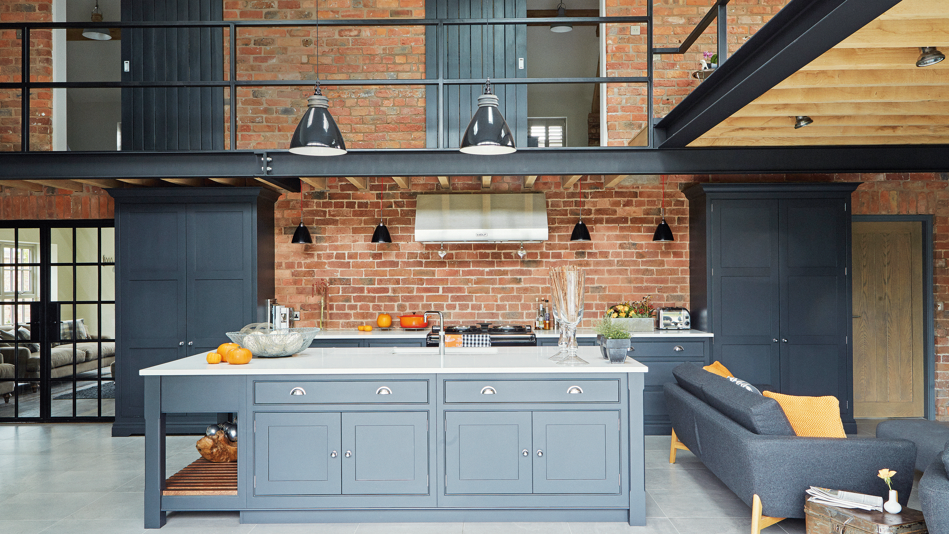 Brick kitchen with grey kitchen island