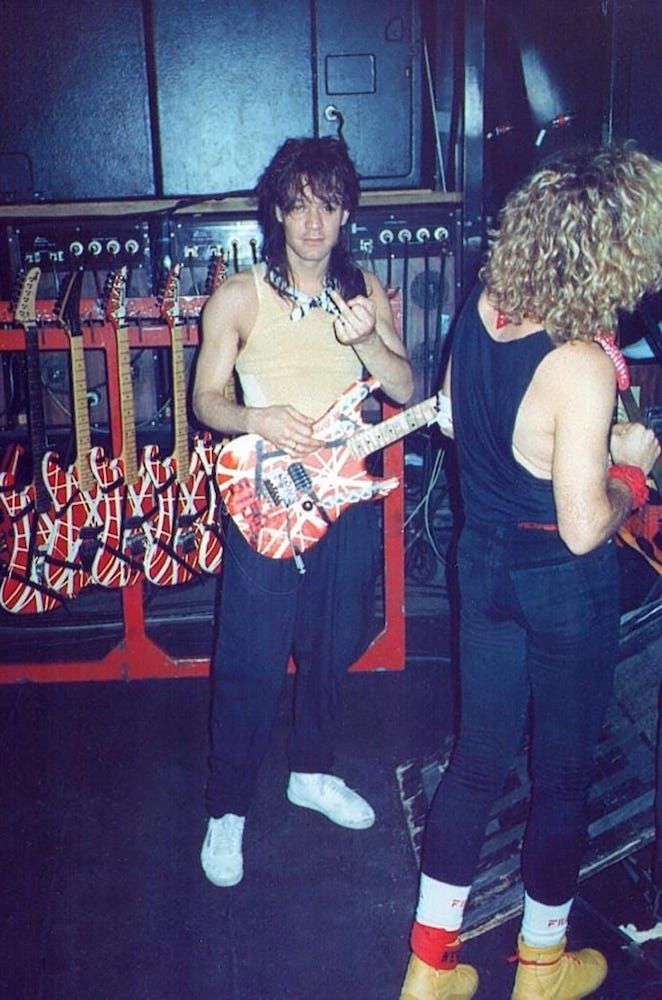 Eddie Van Halen (left) with a hand-built Kramer