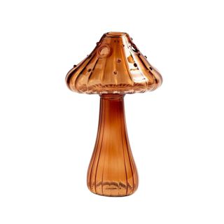 A brown glass mushroom vase