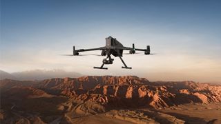 The DJI Matrice 4 in flight over mountains