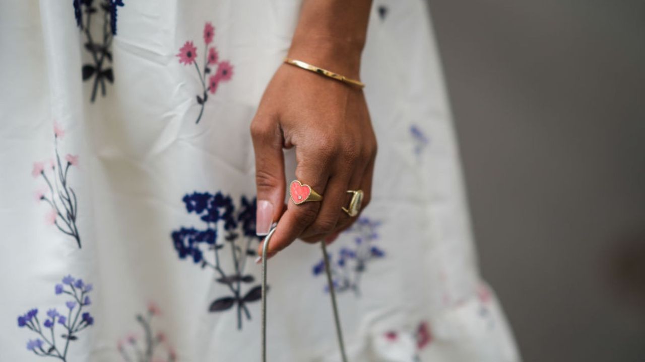 a picture of a woman&#039;s hand - milky nails