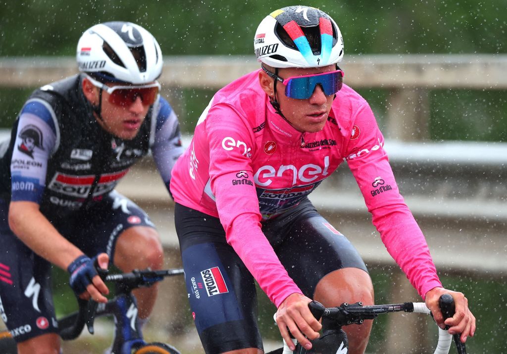 Soudal Quick Steps Belgian rider Remco Evenepoel R wearing the overall leaders pink jersey competes during the third stage of the Giro dItalia 2023 cycling race 216 km between Vasto and Melfi on May 8 2023 Photo by Luca Bettini AFP Photo by LUCA BETTINIAFP via Getty Images