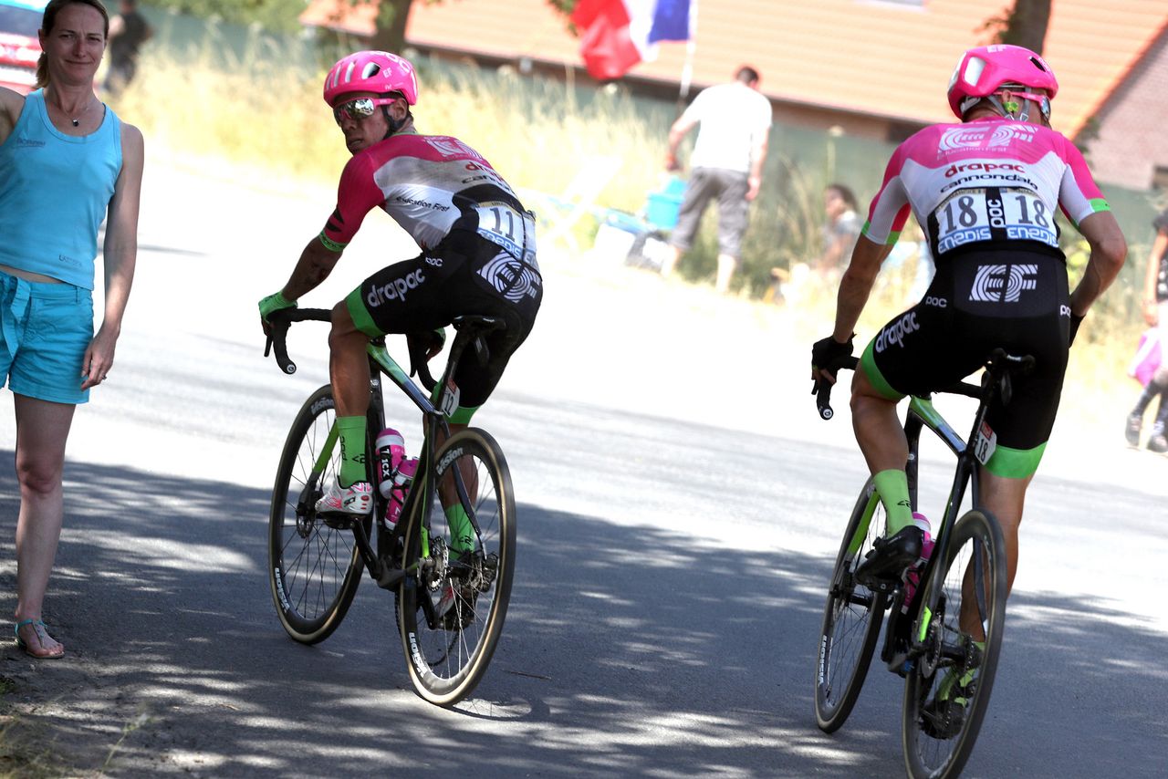 Rigoberto Uran looks for the EF-Drapac team car after a crash