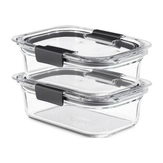 Two small rectangle glass food containers with locking glass lids stacked on top of one another