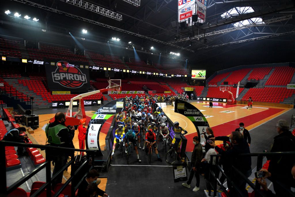 MUR DE HUY BELGIUM APRIL 21 The Peloton at start in Spirou Basket Charleroi Clubs court in Charleroi City during the 85th La Fleche Wallonne 2021 Men Elite a 1936km race from Charleroi to Mur de Huy 204m FlecheWallonne on April 21 2021 in Mur de Huy Belgium Photo by Luc ClaessenGetty Images