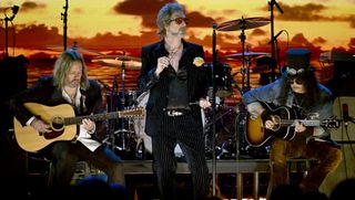 (from left) Rich Robinson, Chris Robinson, and Slash perform at The Kia Forum in Inglewood, California on January 30, 2025