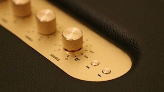 Golden knobs on the top give you physical playback controls