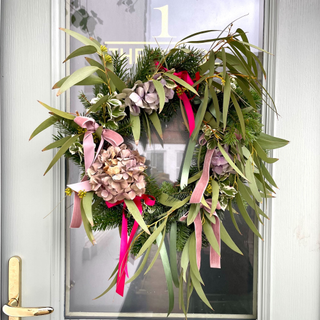 Hydrangea wreath hanging on front door