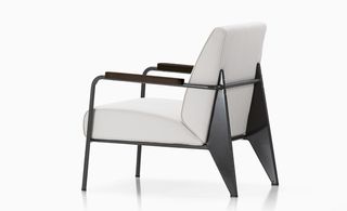Thick padded white chair with black frame
