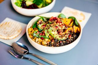 How many servings of fruit and vegetables per day?: A bowl of quinoa and veg