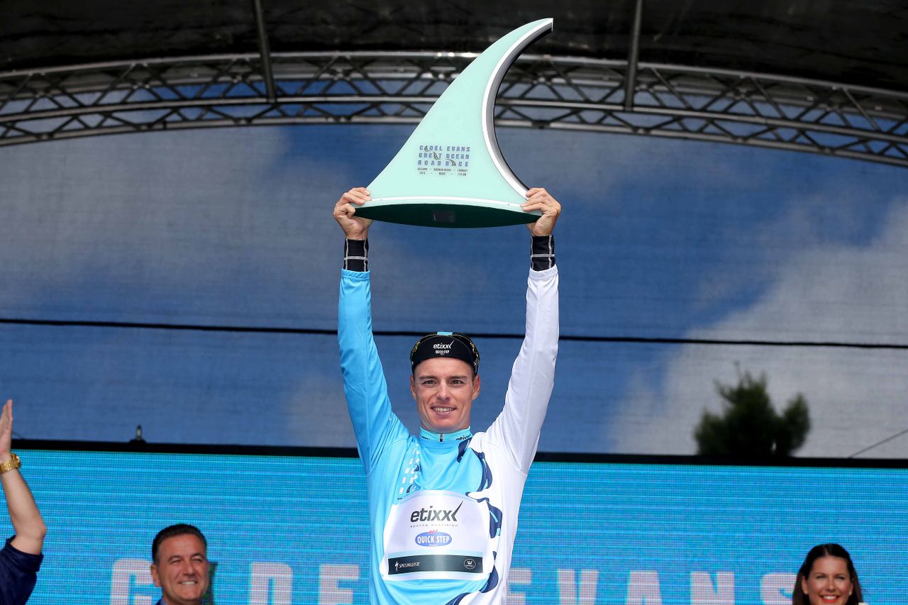 Gianni Meersman (Etixx-Quick Step) holding his trophy aloft