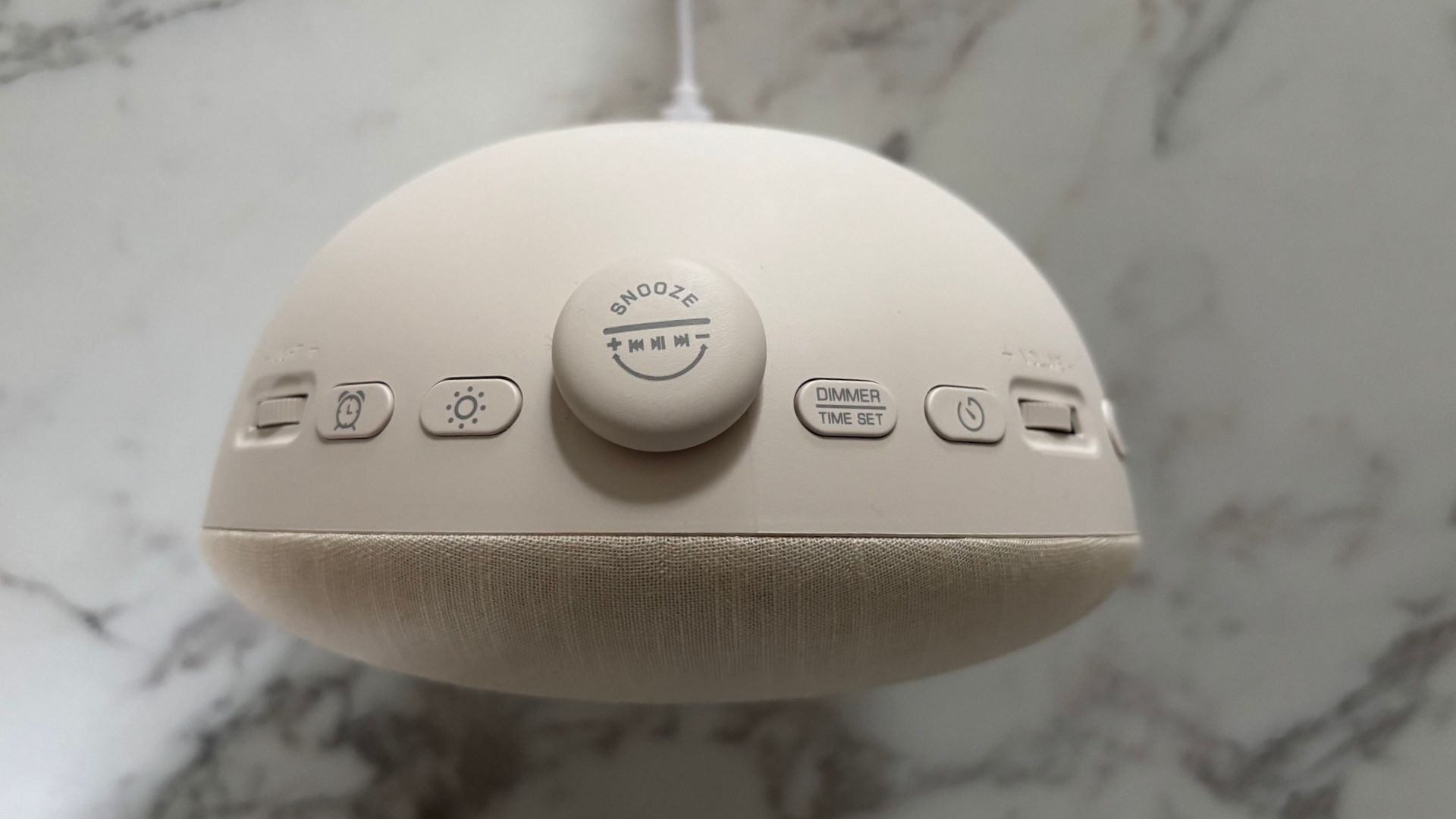 The image shows the control buttons of the Dreamegg Sunrise 2 alarm clock
