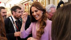 Catherine, Princess of Wales talks with guests as she attends a reception at Buckingham Palace, on the 100th anniversary of the birth of Queen Elizabeth II on April 21, 2026