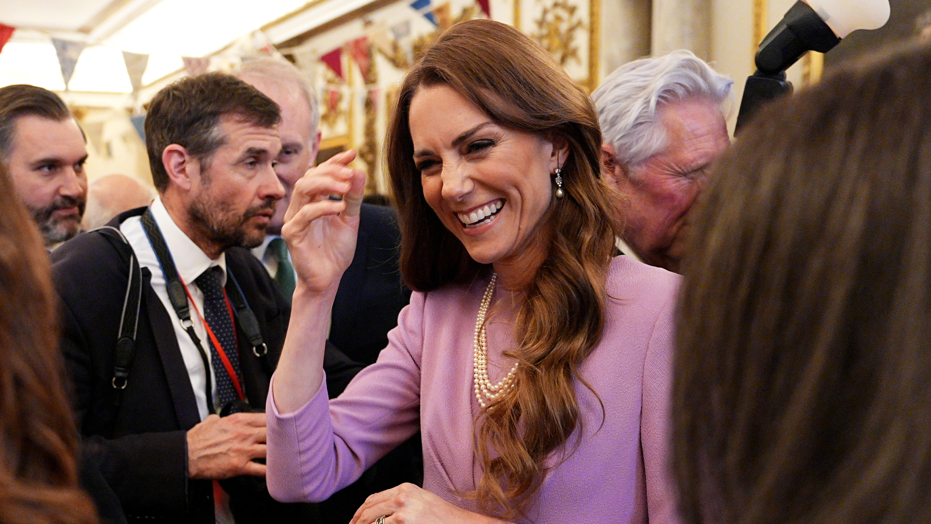 Catherine, Princess of Wales talks with guests as she attends a reception at Buckingham Palace, on the 100th anniversary of the birth of Queen Elizabeth II on April 21, 2026