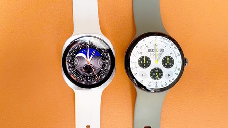 Close-up of the Samsung Galaxy Watch 9 next to the Google Pixel Watch 5