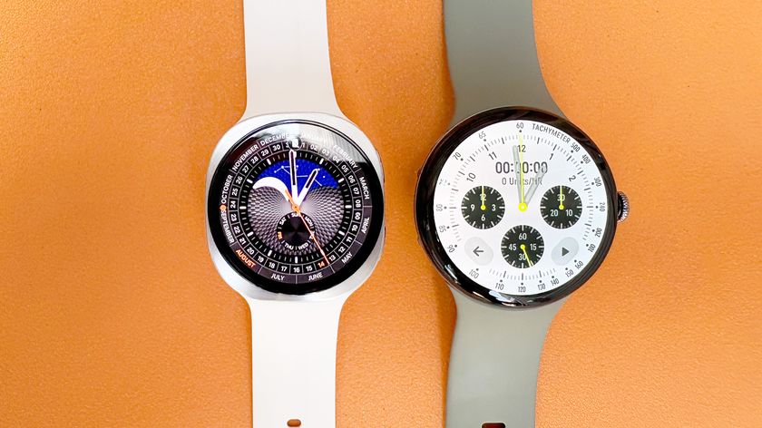 Close-up of the Samsung Galaxy Watch 9 next to the Google Pixel Watch 5