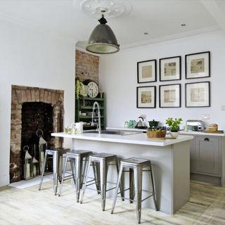 kitchen with wall frame and metal stool
