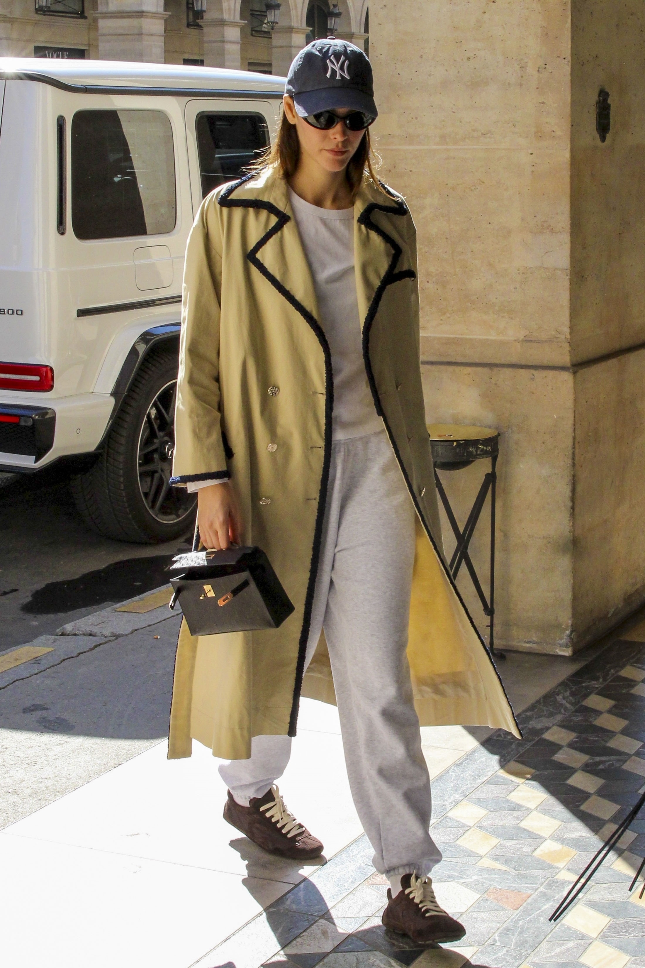 Vittoria Ceretti wore the ballet sneakers trend with a Chanel trench coat