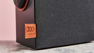 close up of Morel Biggie speaker grill tag