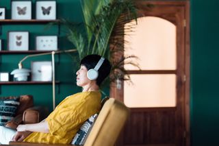 Woman with headphones relaxing