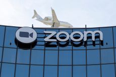 Zoom's head office in San Francisco with a plane right above it