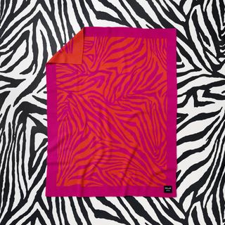Double sided red and pink zebra print blanket
