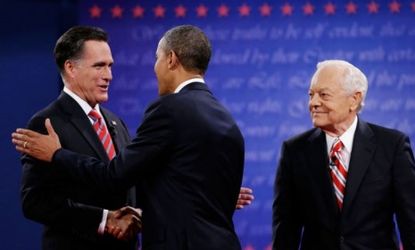 Mitt Romney greets President Obama at the final presidential debate.