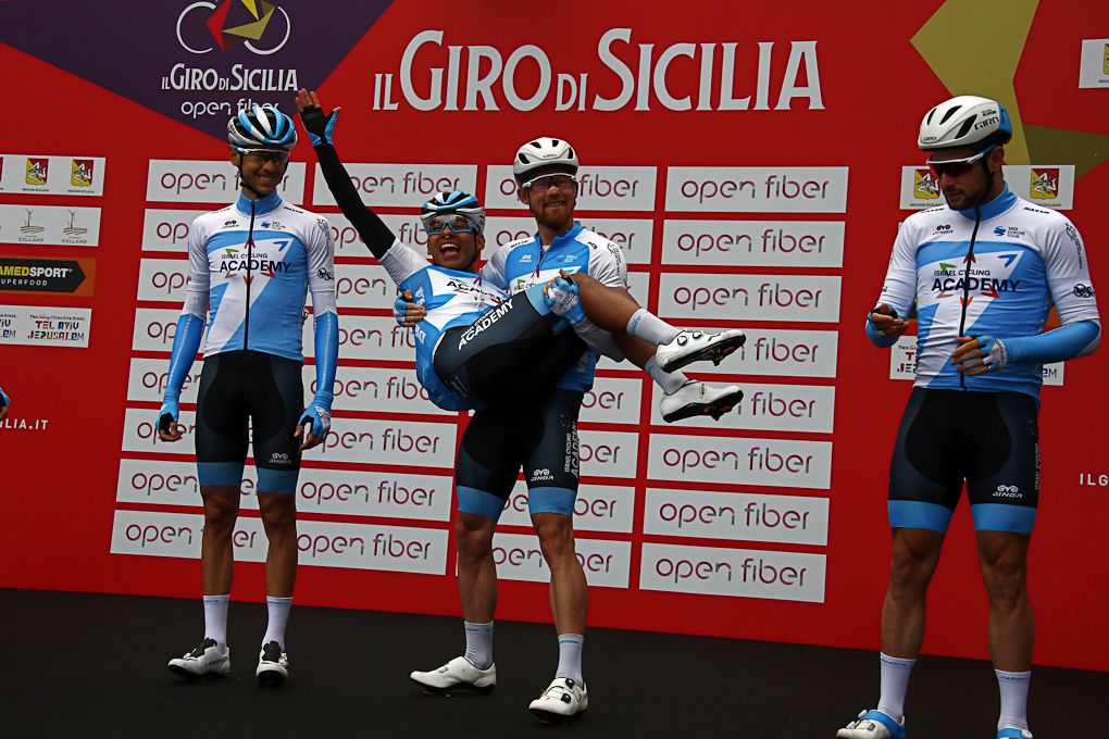 Israel Cycling Academy riders have fun on the podium before the start of stage 3 at Giro di Sicilia