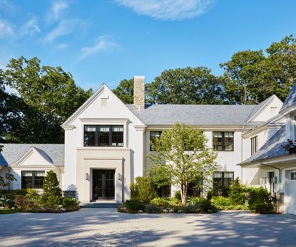 White house, cream entryway, grey roof