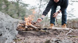 A lean-to campfire in progress