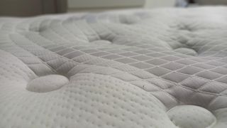Close up on cover of Sealy Elevate Ultra Antuco mattress