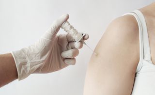 Woman getting injection