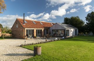 brick barn with timber clad extension
