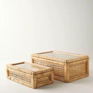 Rattan Box with Glass Lid against a gray background. 