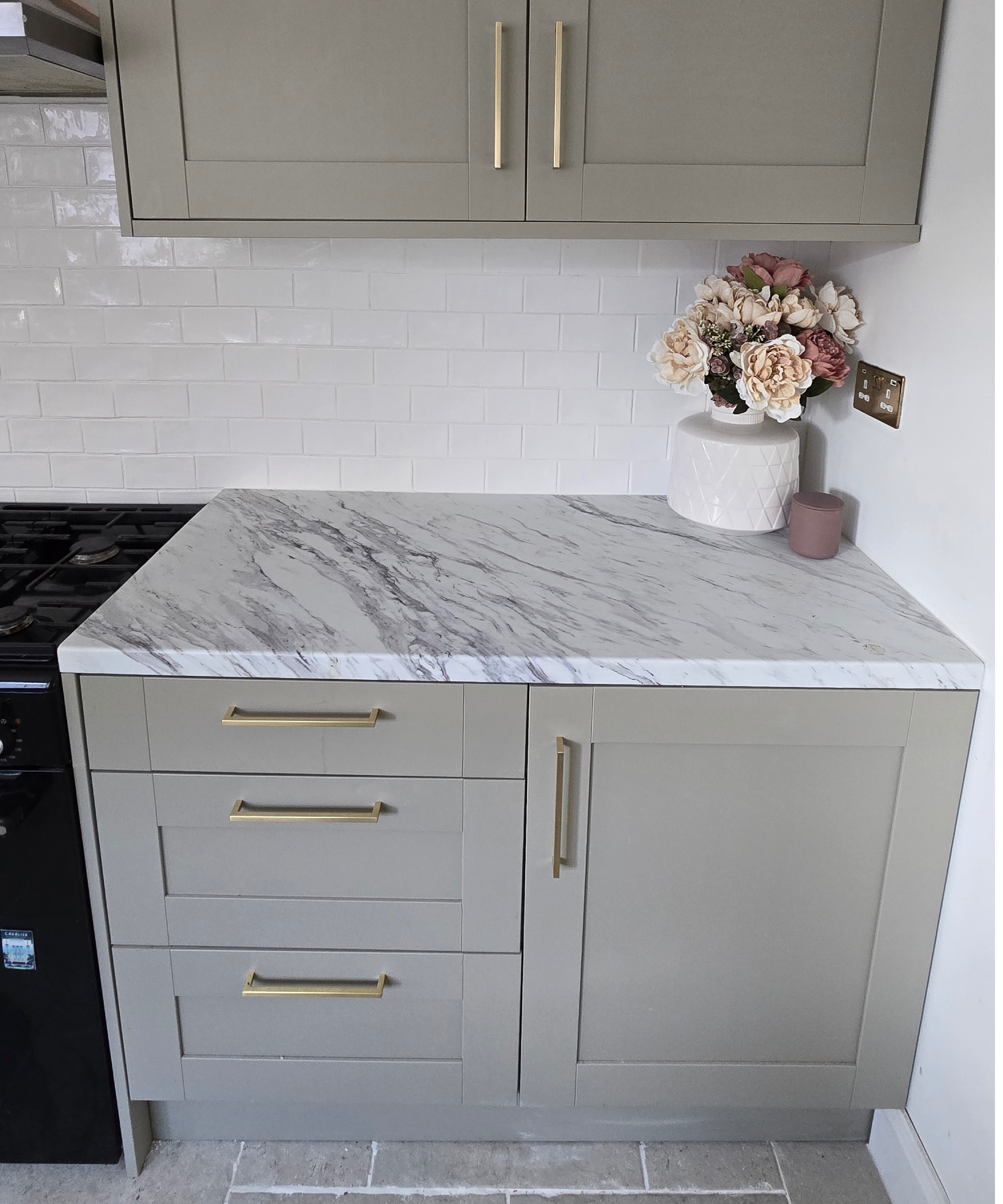 Wickes Ohio kitchen in green with marble look worktop