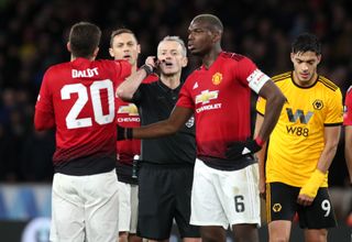 Diogo Dalot, left, appeals in vain for a penalty