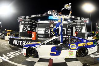 Chase Elliott celebrates after winning the NASCAR Cup Series Xfinity 500 at Martinsville Speedway on Nov. 1, 2020 in Martinsville, Virginia.