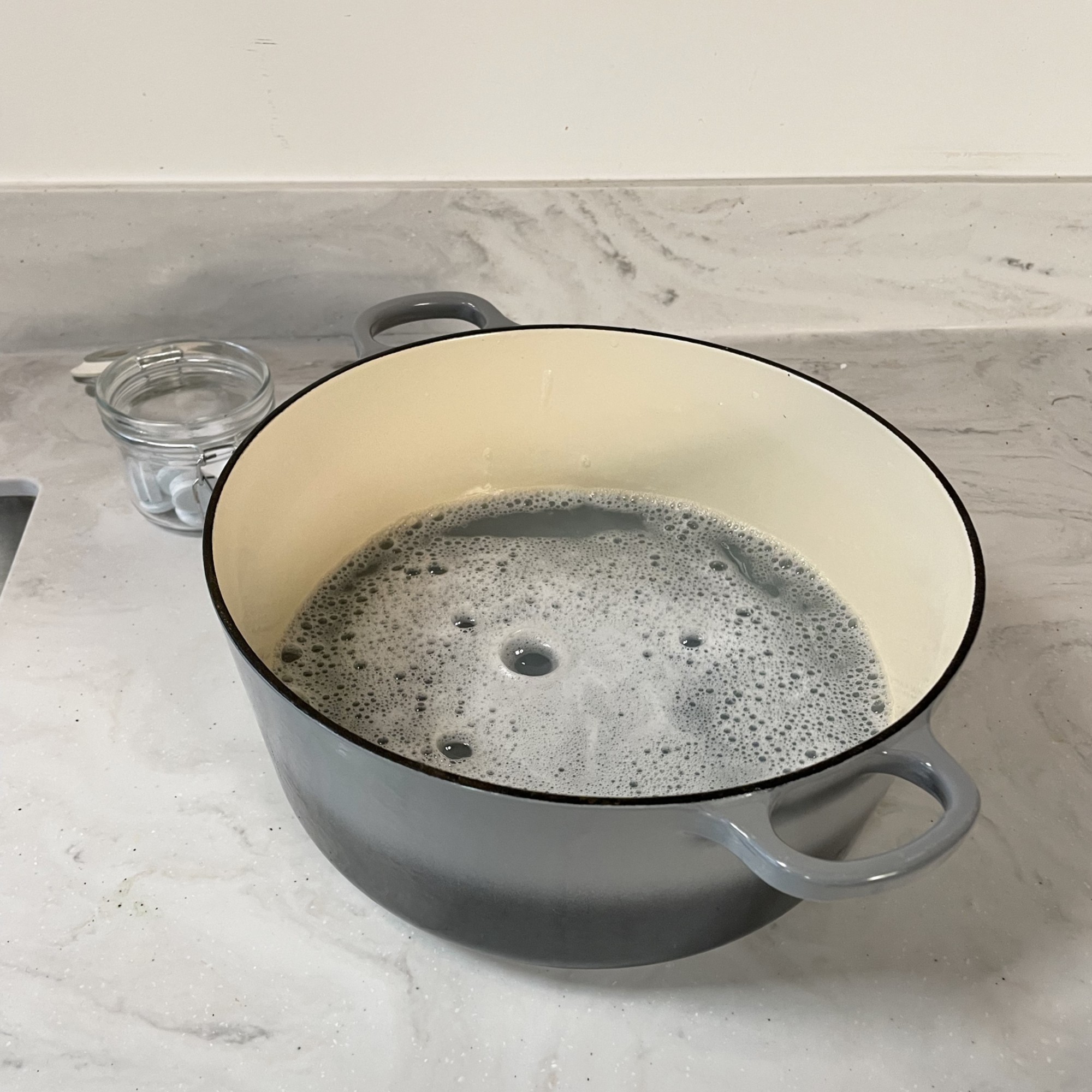 Cleaning enamel cookware using denture tablets