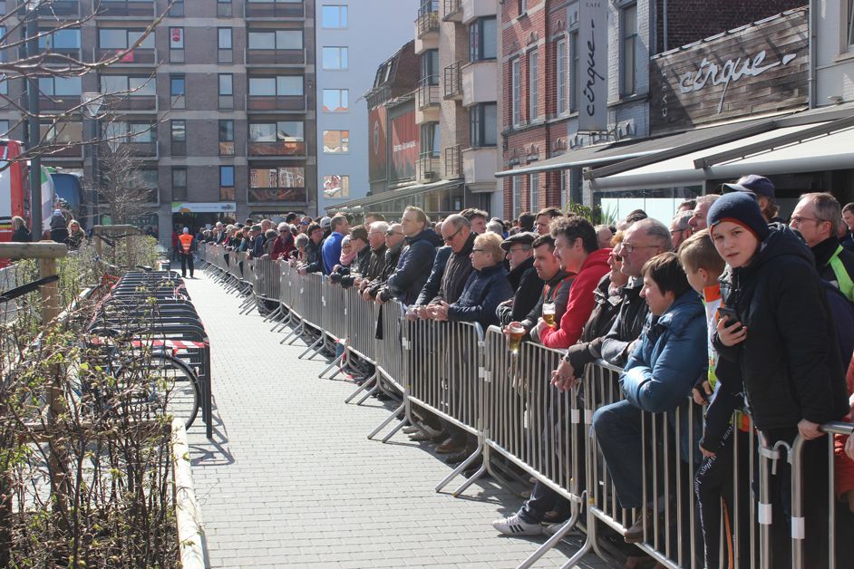 Fans lining up to catch a glimpse of the riders as they head for sign-on