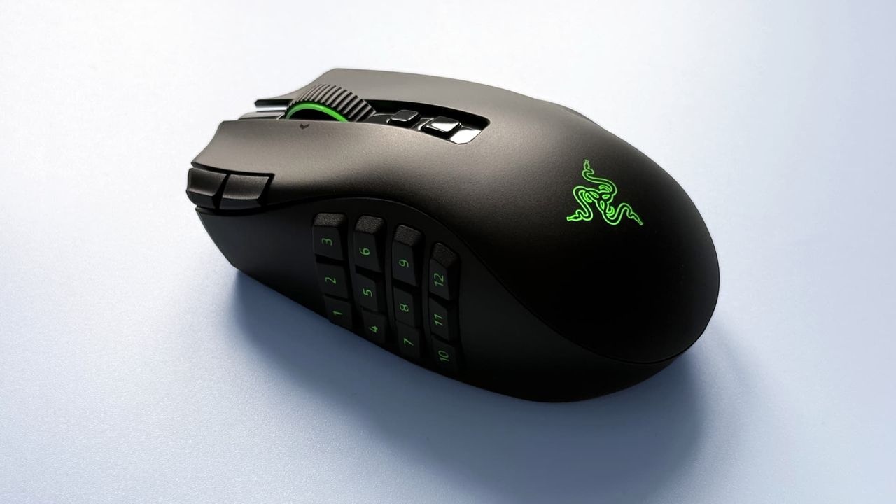 The Razer Naga V3 Pro mouse against a blue background.