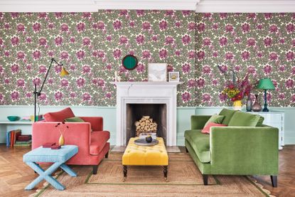 wall patterns created with floral wallpaper in living room featuring velvet sofas in bright colours
