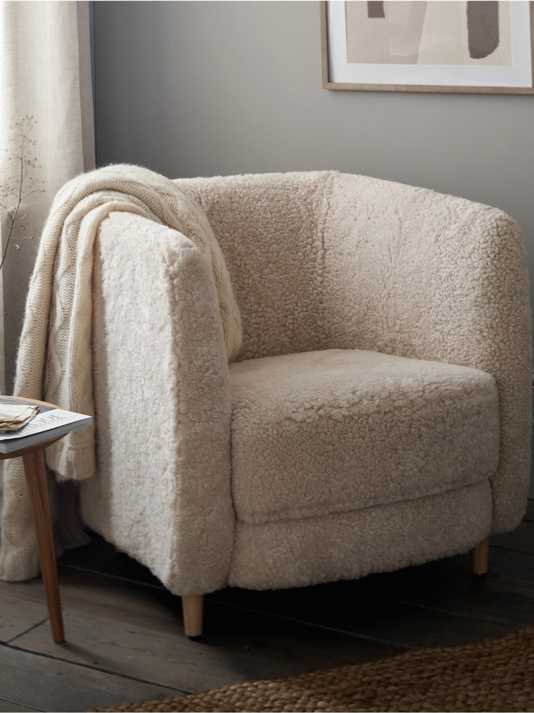 A cozy sheepskin armchair from The White Company