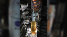 Inside the Vehicle Assembly Building at NASA&rsquo;s Kennedy Space Center in Florida, work platforms are being retracted from around the Artemis I Space Launch System rocket and Orion spacecraft in preparation to roll out for testing.