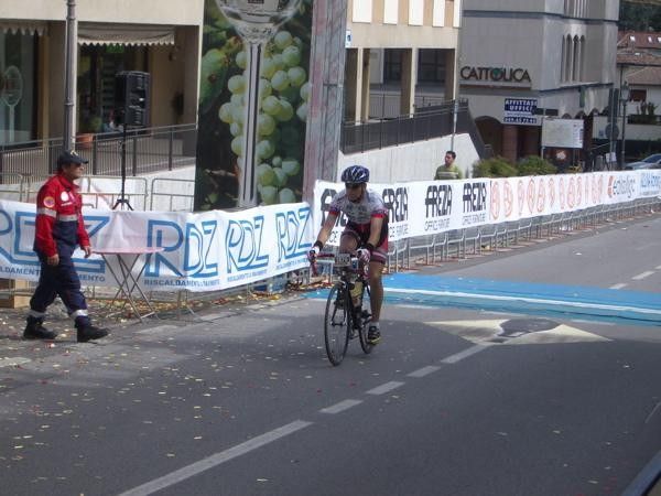 Complementi! One of the last few Gran Fondo riders comes in - a braver man than I was on the day.