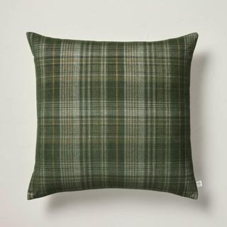 A green gingham pillow