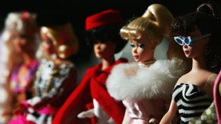 A line of Barbie dolls throughout the years